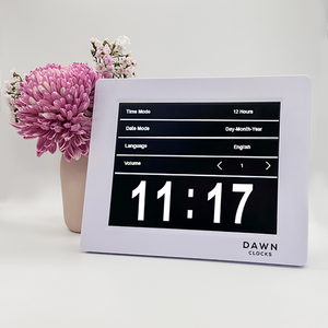 Original Dawn Clock shown on a table with a menu example on the screen. This is ideal for all ages and proved essential for NDIS participants, people living with Dementia, people living with a disability and seniors. ADHD Autism Disability Dementia Alzheimer's