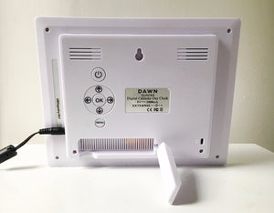 The Original Dawn Calendar and Reminder Clock shown on a table showing its back with easy buttons that are tamper proof. ADHD Autism Disability Dementia Alzheimer's